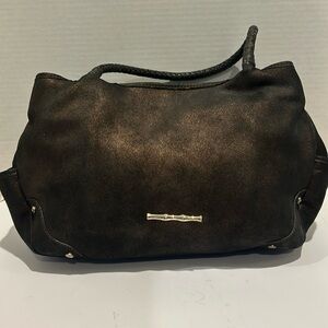 Elaine Turner braided strap bag in bronze leather. has a shimmering gold look.